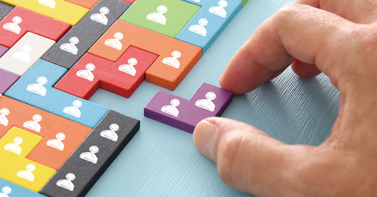 Image Of Tangram Puzzle Blocks With People Icons Over Wooden Table ,human Resources And Management Concept.