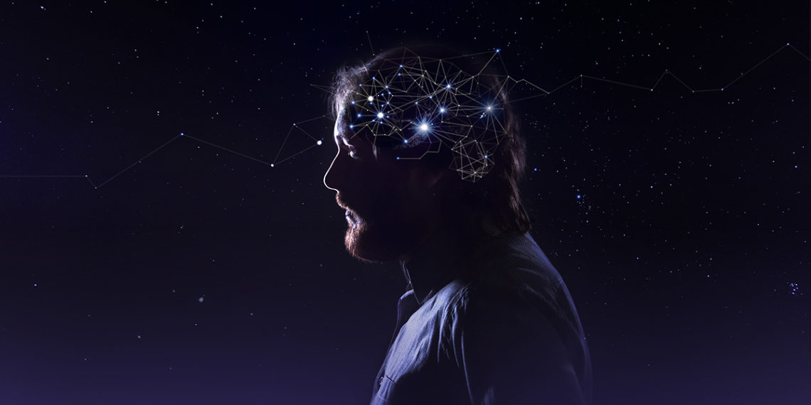 Profile of a bearded man head with a symbol of neurons in the brain