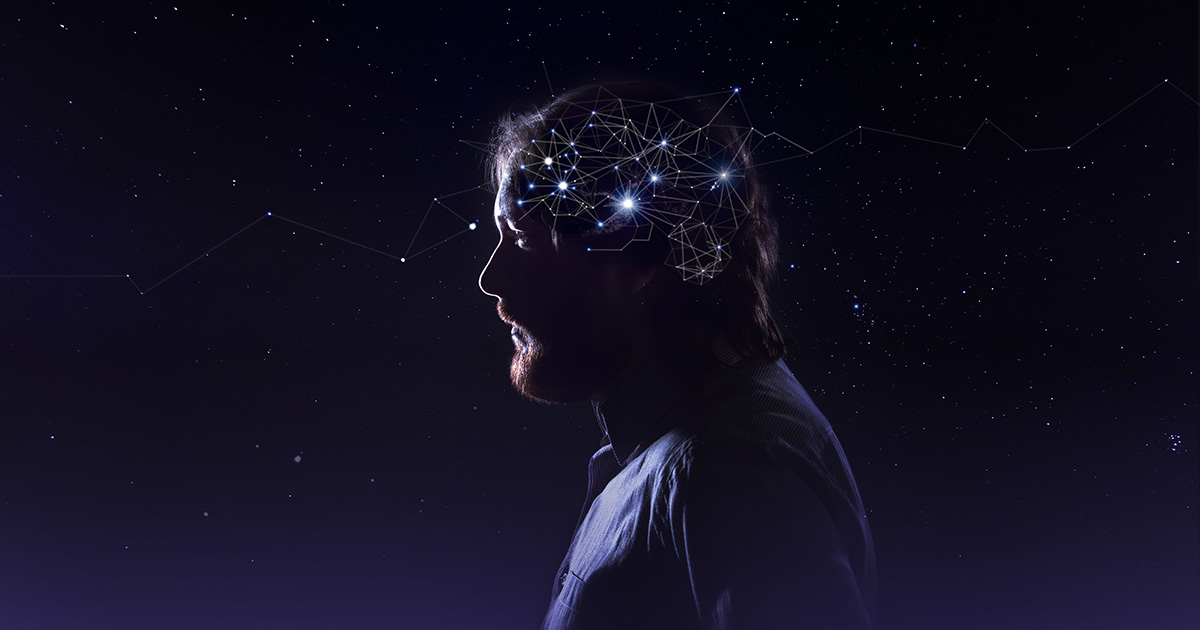 Profile of a bearded man head with a symbol of neurons in the brain