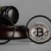 1200 view bitcoin through eyeglasses lens closeup