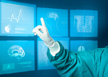 Doctors working on modern virtual screen